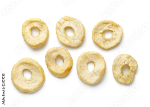 Dried apple rings isolated on white background. Top view. Flat lay.