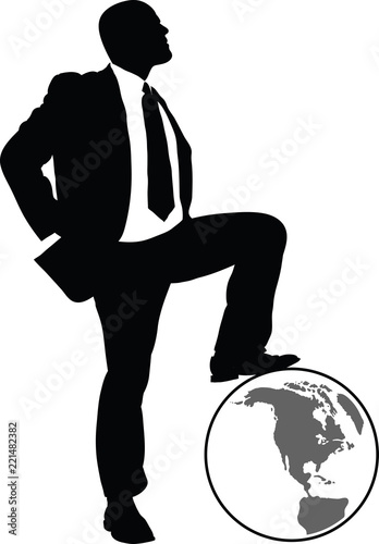 A silhouette illustration of a businessman standing with his foot on a globe of the earth.