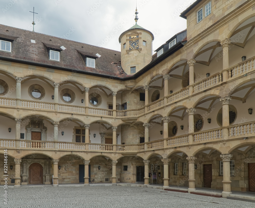 The castle courtyard with many cloisters.