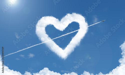 heart shaped cloud and airplane in the sky 3