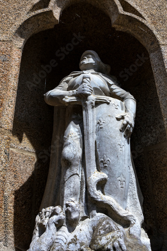 Sculpture in medieval abbey Mont Saint-Michel in France photo