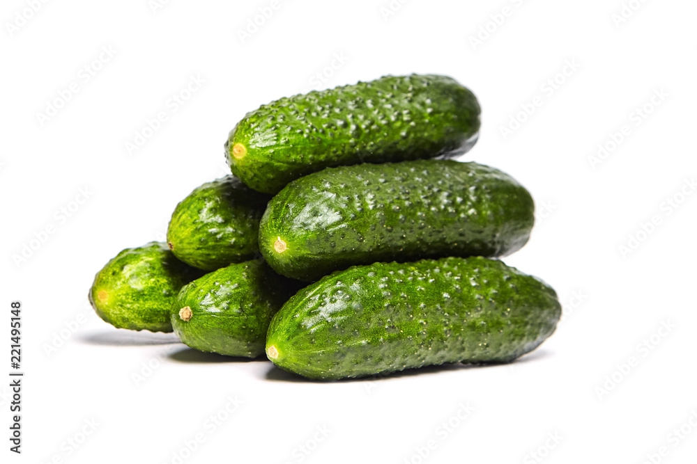 Heap of fresh green Cucumbers isolated on white background Heap of fresh green Cucumbers isolated on white background