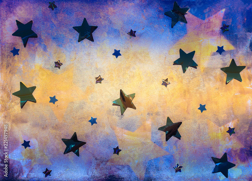 Textured bright coloured blue and yellow background with foil stars decoration 