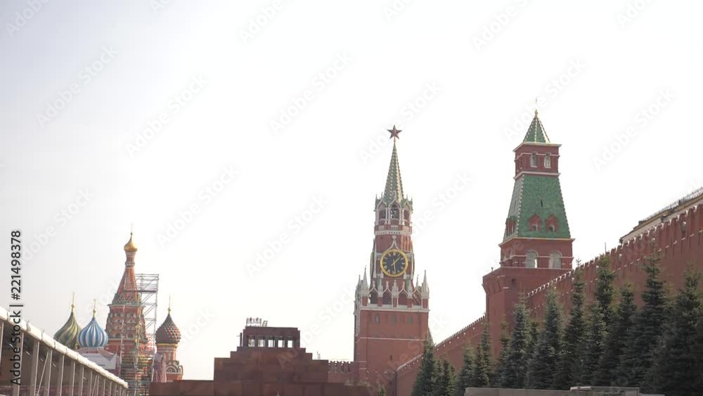Tourists walking on the Red Square near the Kremlin on beautiful sunny day in Moscow, Russia. Russia travel tourism moscow main attraction lifestyle Tourists walking on the Red Square near the Kremlin on beautiful sunny day in Moscow, Russia. Russia travel tourism moscow main attraction lifestyle
