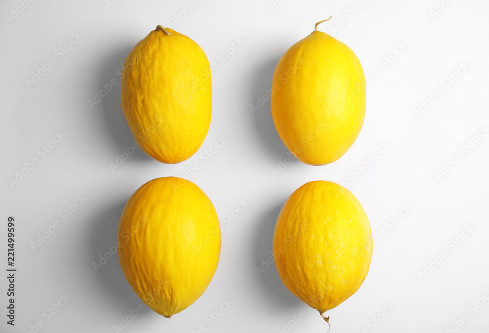 Flat lay composition with melons on white background Flat lay composition with melons on white background