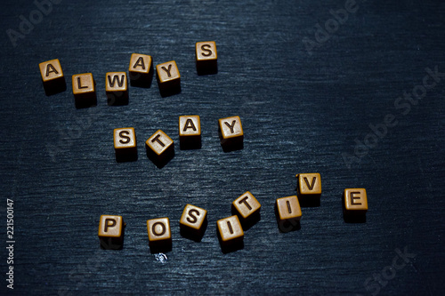 Fotografia Always stay positive message written on wooden blocks