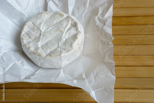 Camembert cheese on a white wrapper