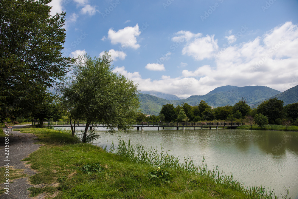 Landscape with misty morning fog in the Forest Lake or Beautiful forest lake in the morning at winter time. Azerbaijan nature. Caucasus.