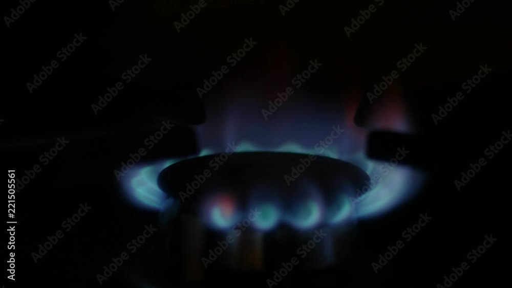 Gas fire in the dark, turning on then off Gas fire in the dark, turning on then off