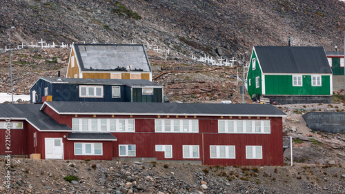 colorful houses in Ittoqqortoormiit, eastern Greenland at the entrance to the Scoresby Sound fjords photo