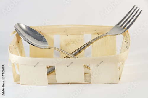 lemon in basket on white background