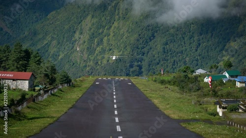 Aircraft Landing on Tenzing–Hillary Airport Runway, Lukla Nepal 4K photo