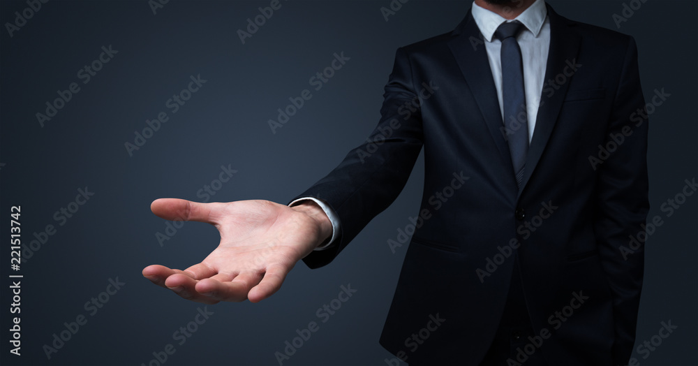 Businessman without head holding something without theme Businessman without head holding something without theme