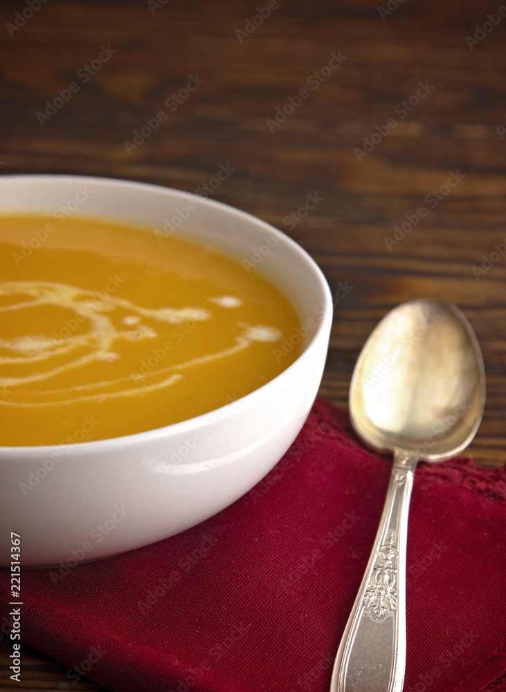 Creamy Butternut Squash Soup on a Wooden Table Creamy Butternut Squash Soup on a Wooden Table