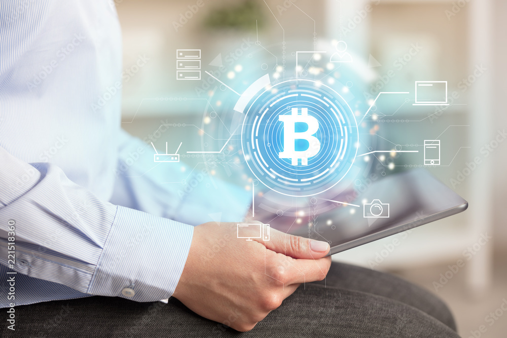 Business woman using tablet in home office mood with cryptocurrency bitcoin link network concept
Business woman using tablet in home office mood with cryptocurrency bitcoin link network concept