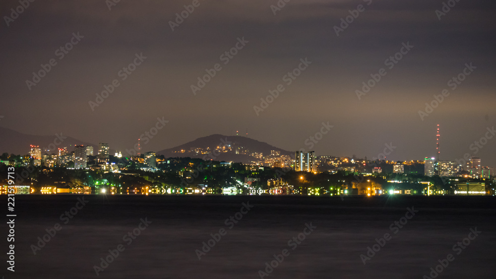 Night view of Black Sea with Sochi on background