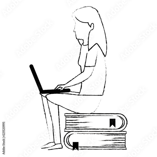 young woman working with laptop in books