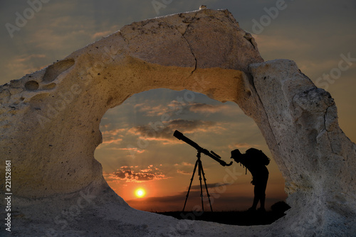 Fototapeta Naklejka Na Ścianę i Meble -  observing the sky with a mystical cave telescope