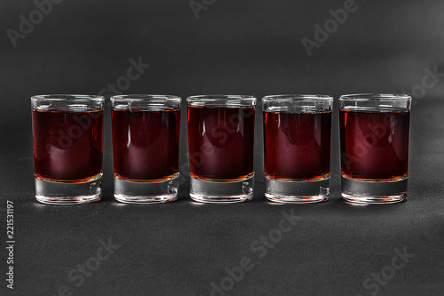 Summer cocktail on isolated black background