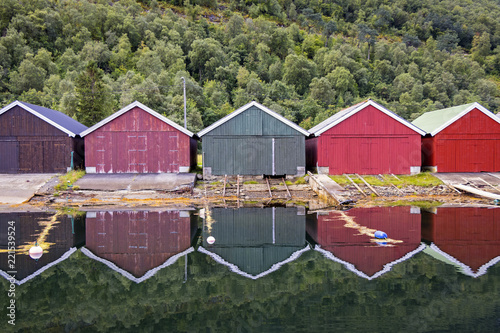 Fotografie Colorful boathouses in the port of Stordal, Norway