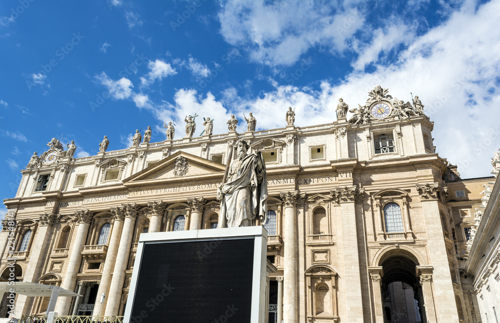 Statue of St. Paul with sword in front of St. Peter's Basilica in Vatican City, Rome, Italy