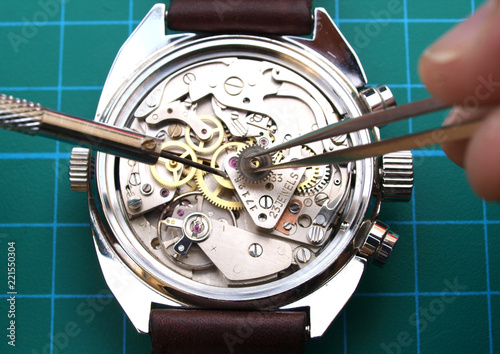 watchmaker working repairing watch