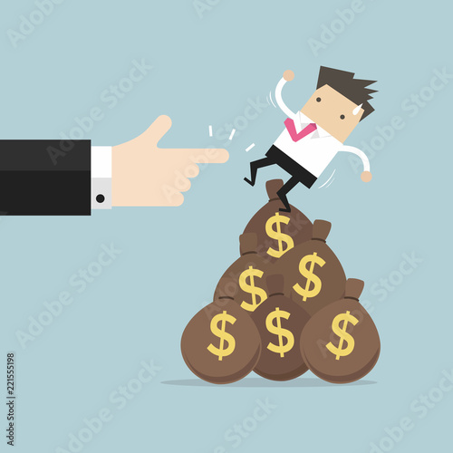 Businessman falling from money bag.