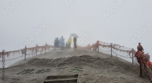 Huashan mountain stairs trail with mist and fog - Xian, Shaaxi Province, China photo