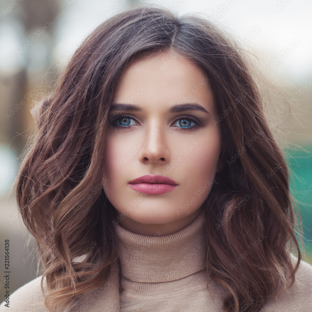Young beautiful female face closeup, portrait Young beautiful female face closeup, portrait