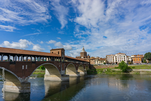 Ponte coperto ( covered bridge ) or Ponte Vecchio over Ticino river in Pavia, Lombardy, Italy