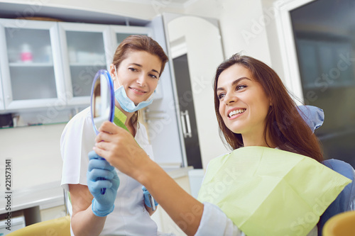 A woman and a dentist in a dental clinic.