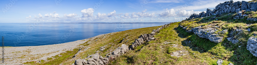 Burren way trail with Galway bay in background Burren way trail with Galway bay in background