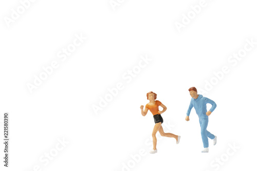 Miniature people   Couple running on white background