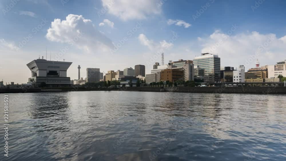 Time laps of cityscape view at Yokohama bay reflection on water Time laps of cityscape view at Yokohama bay reflection on water