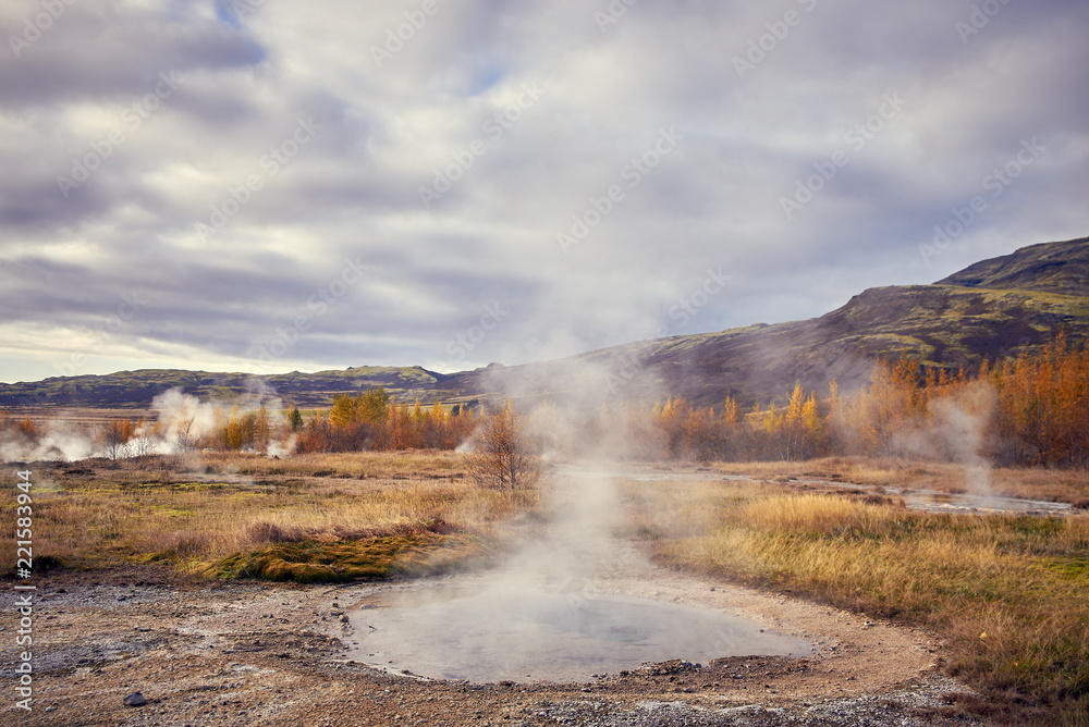 steam from geysers in Iceland in autumn steam from geysers in Iceland in autumn