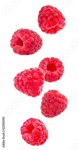 Falling raspberries isolated on a white background