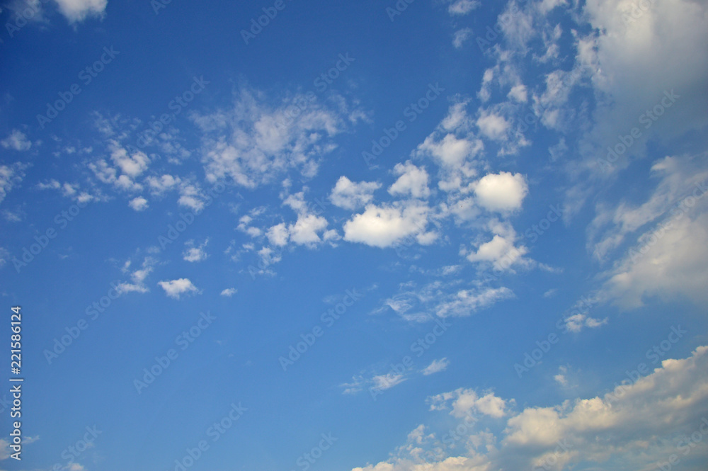 Summer sky with light white clouds on a bright sunny day Summer sky with light white clouds on a bright sunny day