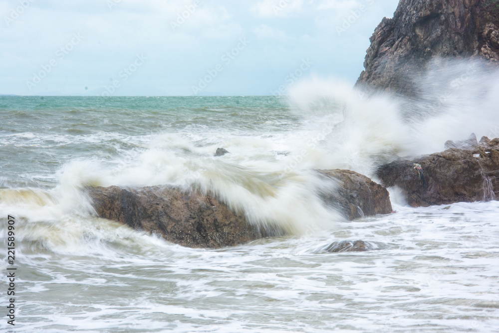 sea waves hit the rocks