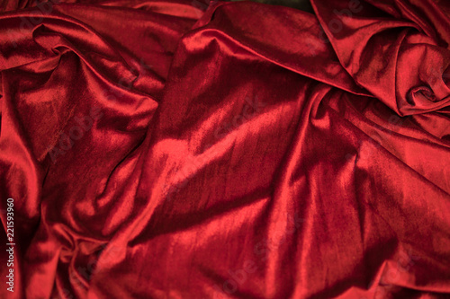 Fold soft waved red velour fabric textured background