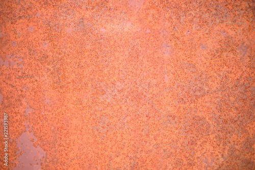 Rusty and damaged metal background. Old orange metal textured background.