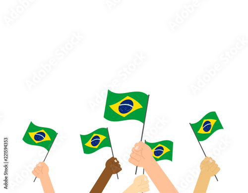 Vector illustration hands holding Brazil flags on white background
