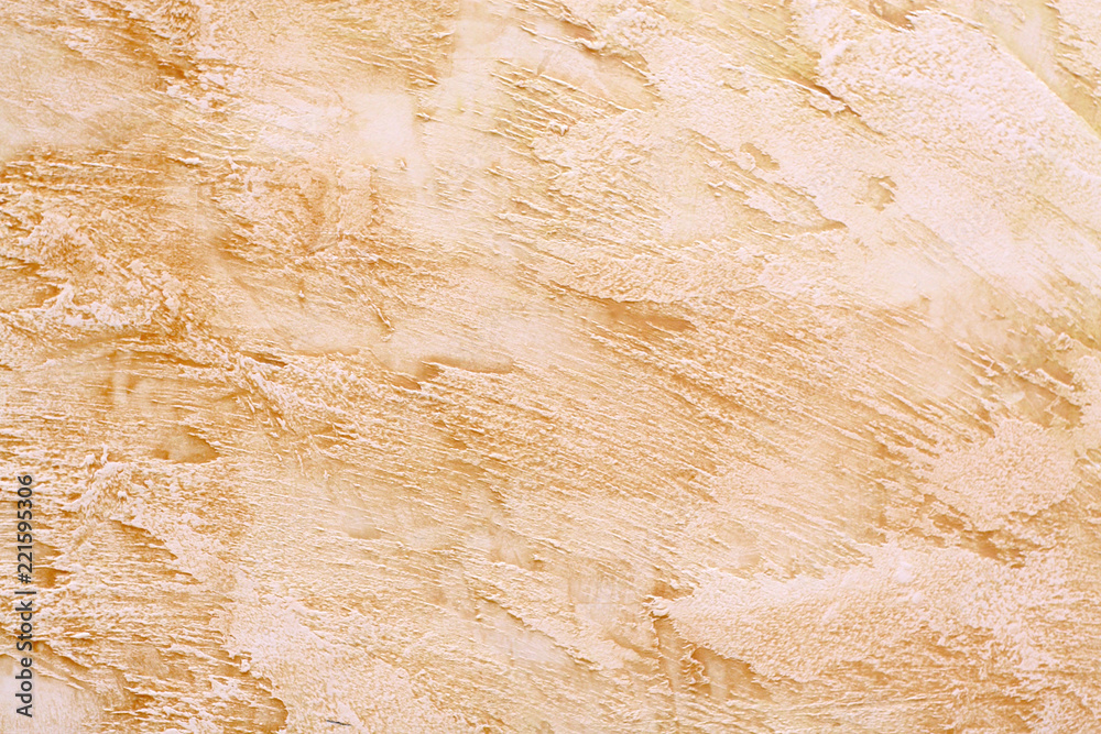 Obraz premium Decorative beige plaster on the wall.