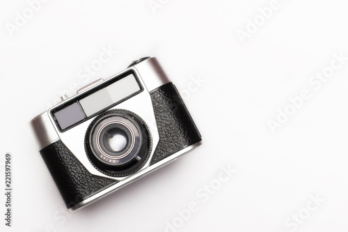 Vintage old photo camera on white background from top