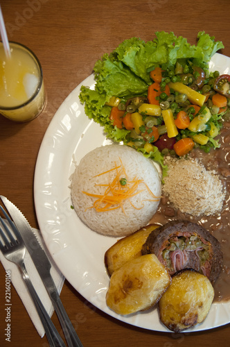 Plate of Food with Rice, Vegetables, Meat