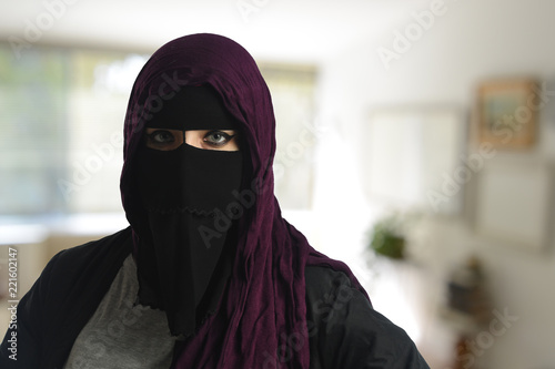 Islamic woman wearing a burqa photo