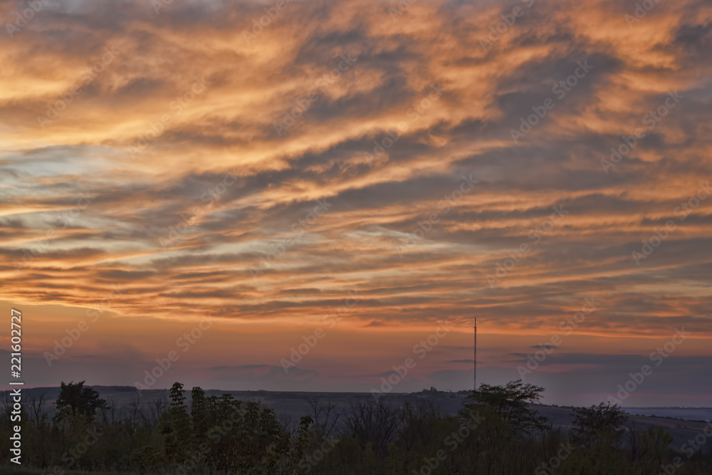 Fototapeta premium Dramatic sky at sunset over the mountain Karachun