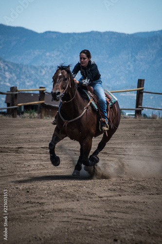 Cowgirl Barrel Races © Robiny