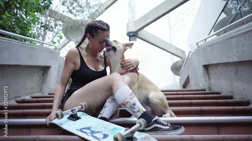 skater girl with dog photo