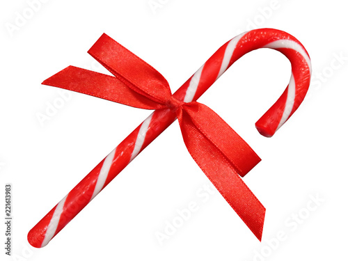 candy cane with ribbon bow isolated on white background
