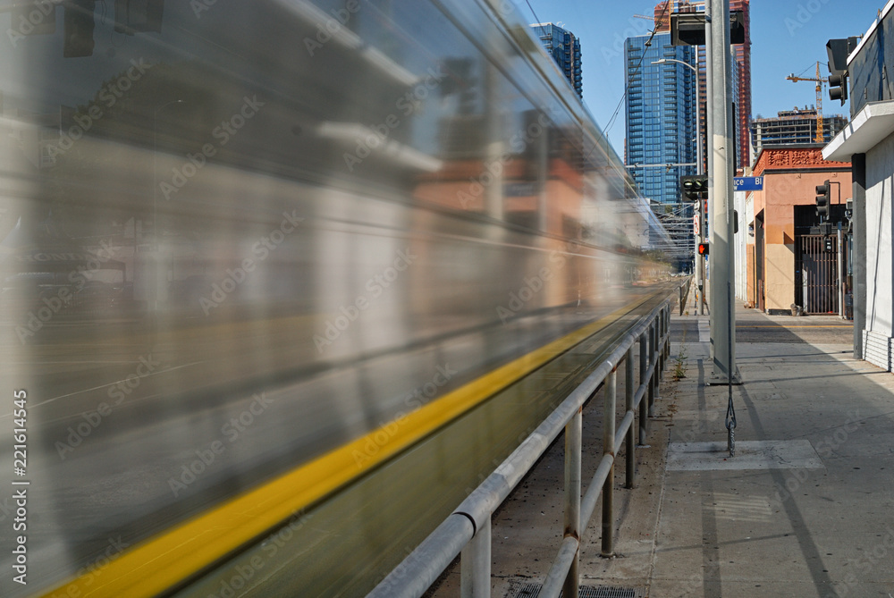 Metro train cruising down Flower street towards downtown Los Angeles. Metro train cruising down Flower street towards downtown Los Angeles.